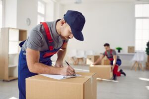 business team planning an office move in Midlothian with boxes and moving checklist