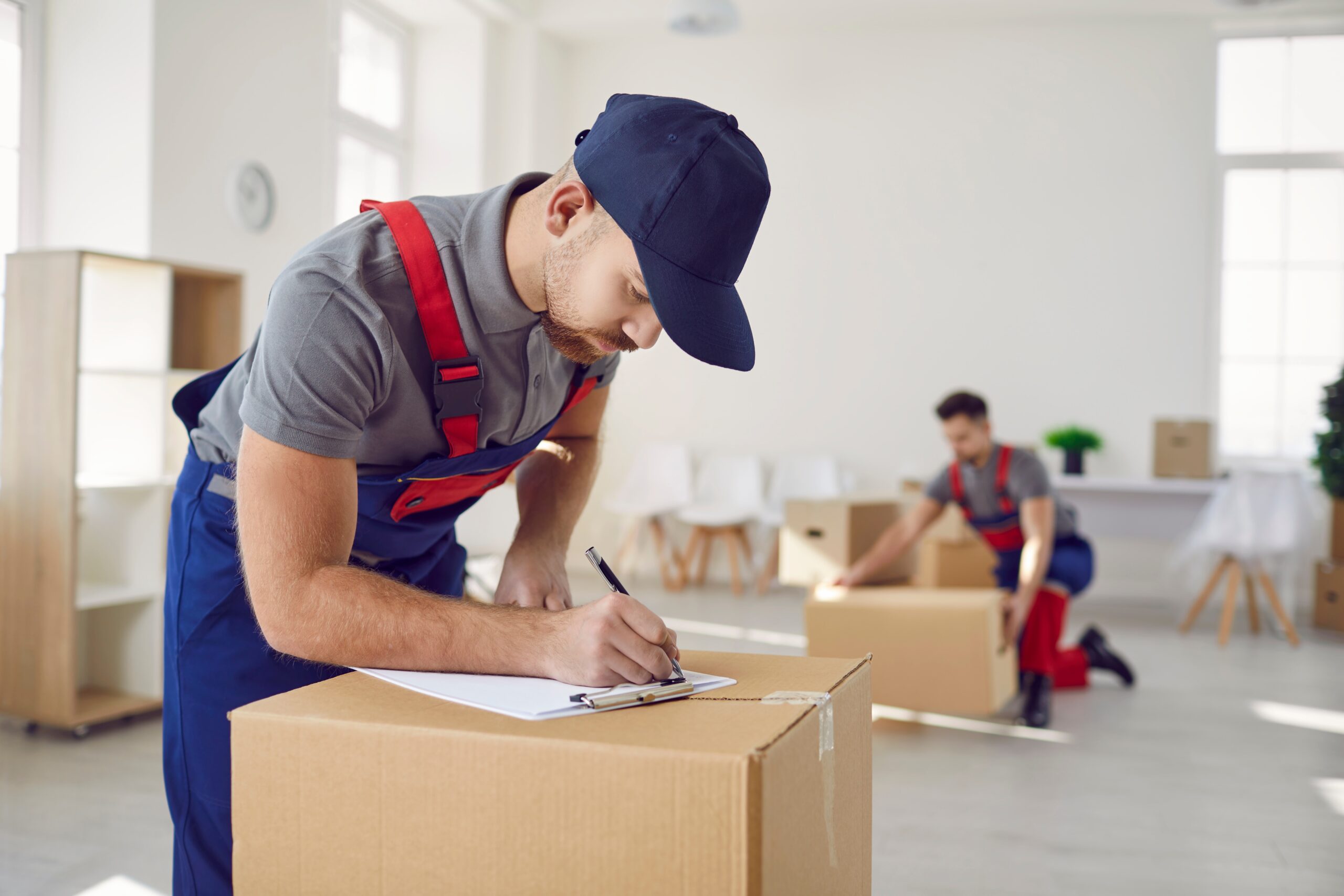 business team planning an office move in Midlothian with boxes and moving checklist